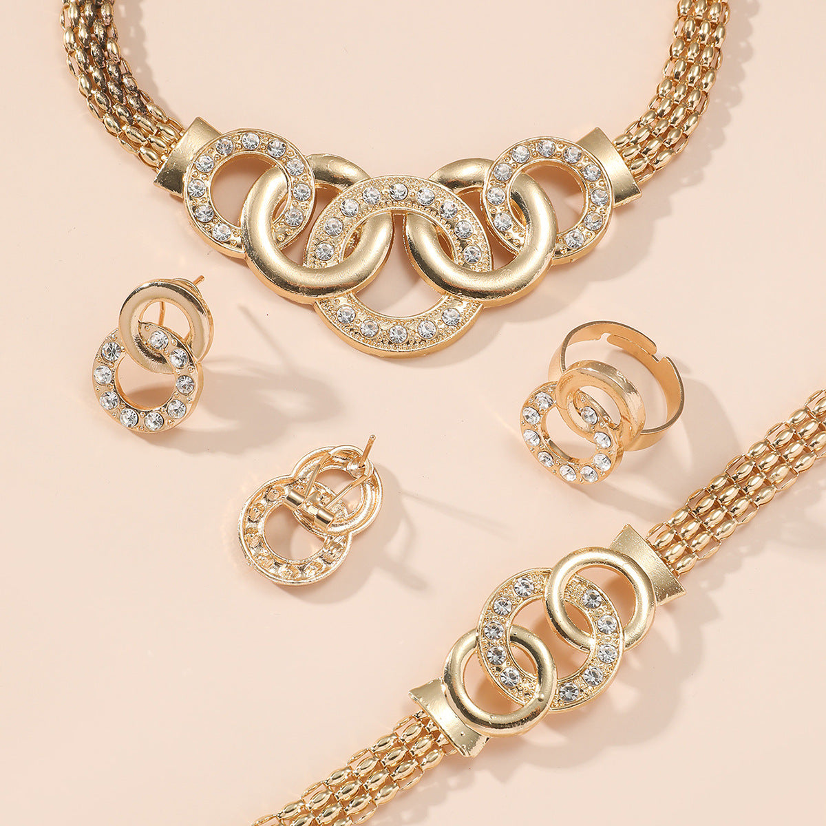 g necklace stud earrings bracelet ring suit