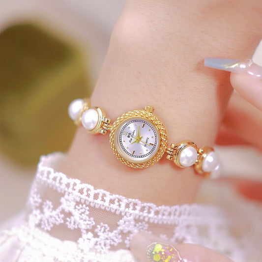 A light luxury pearl bracelet watch for elegant women